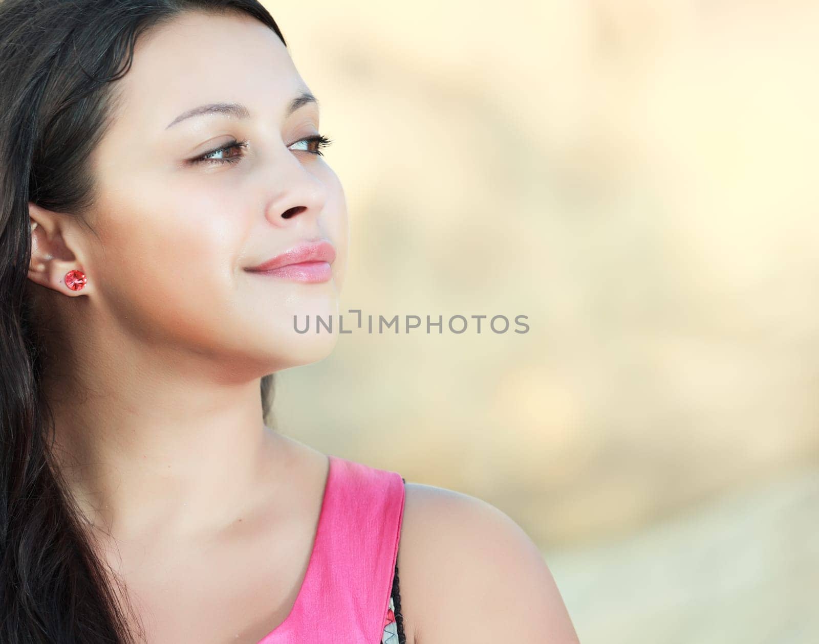 Young beautiful woman outdoor at sunrise time