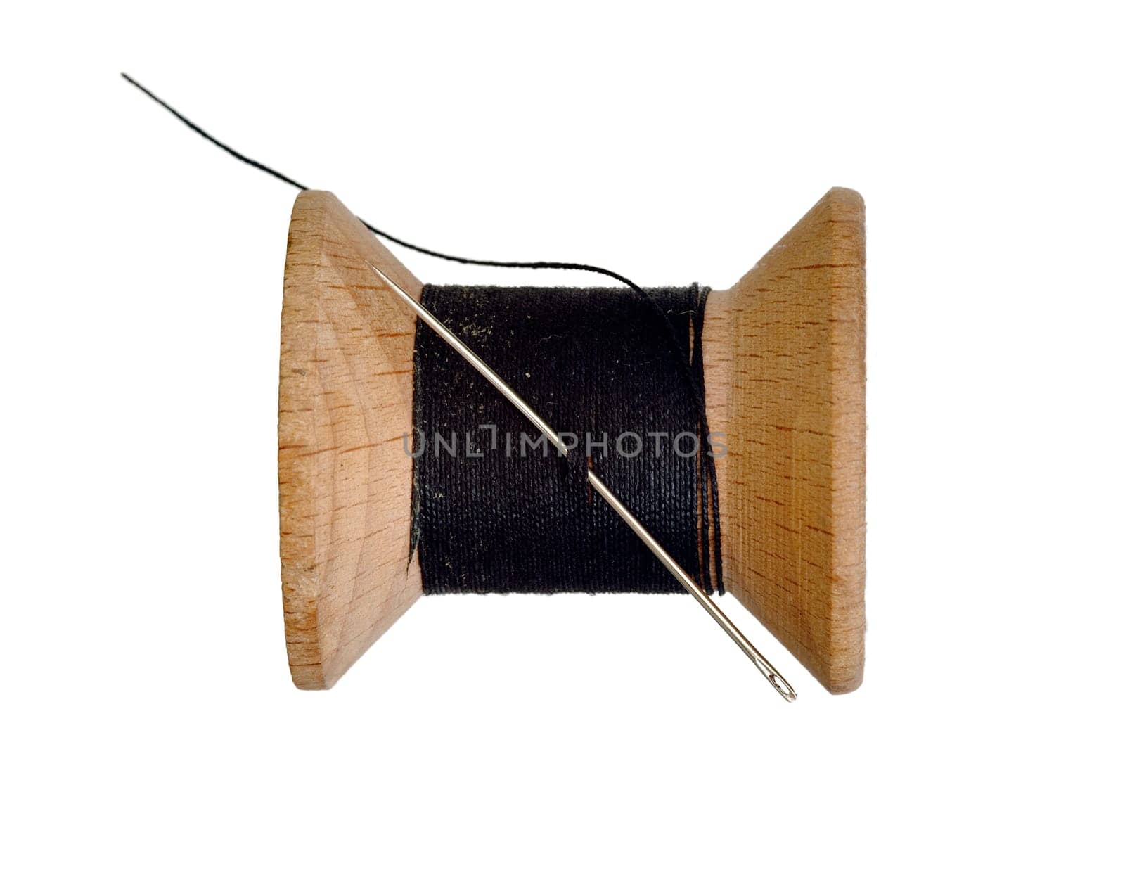 Detail of the sharp needle and black thread