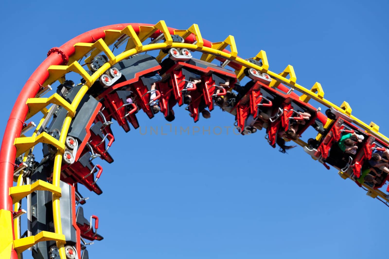 Roller coaster in front of blue background,attraction in amusement park