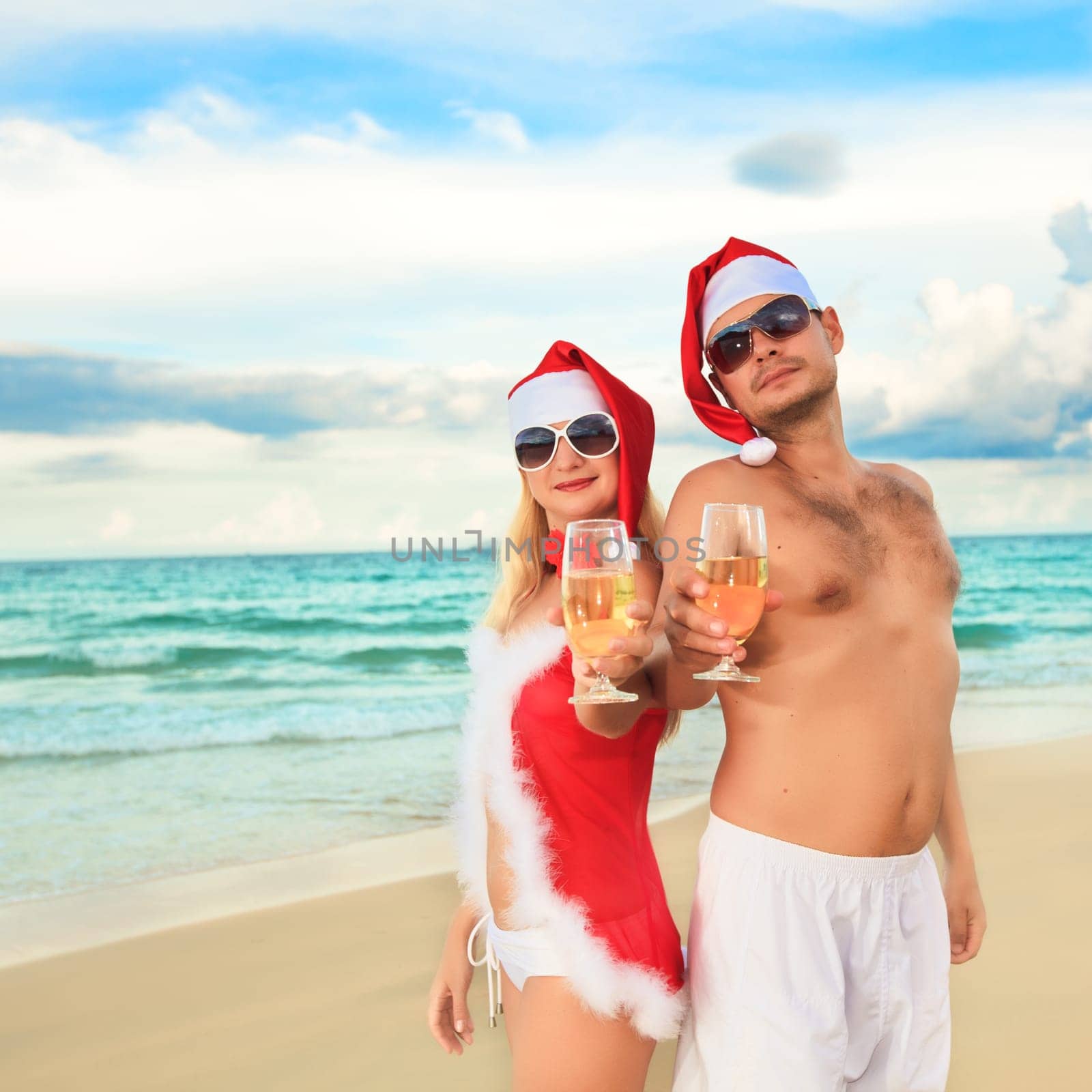 Couple celebrates Christmas at the tropical beach