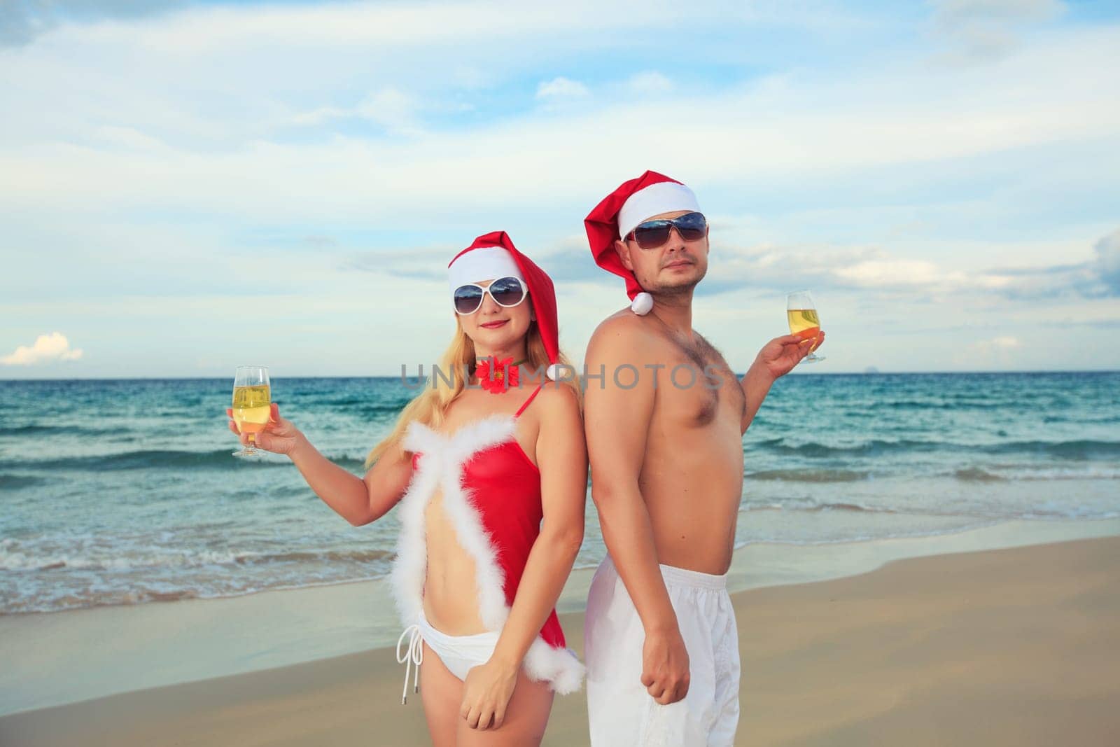 Couple celebrates Christmas at the tropical beach