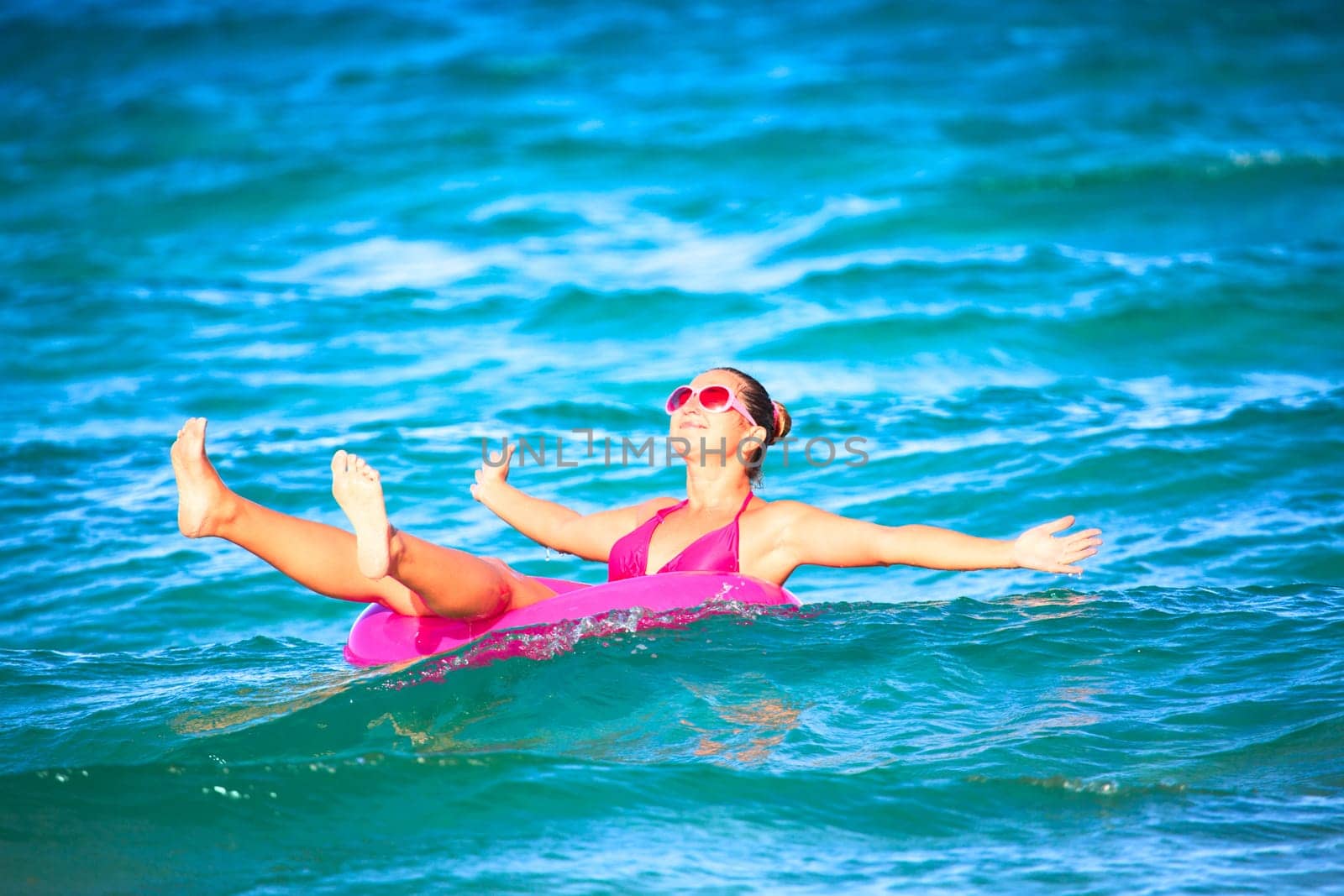 Woman have a fun time in the sea