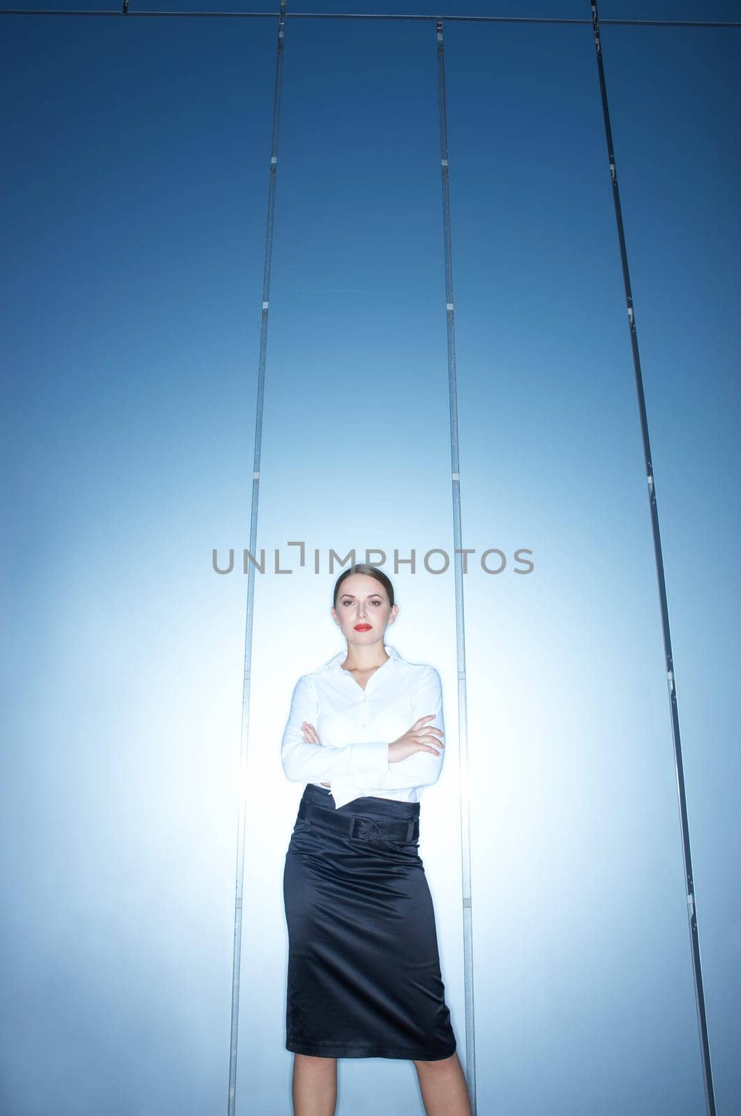 Beautiful business woman standing outdoor modern building