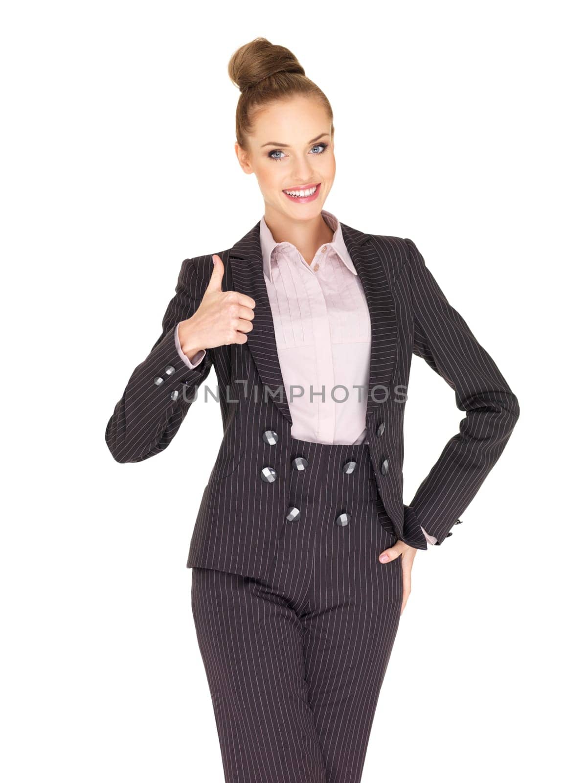Young business woman showing thumb up gesture