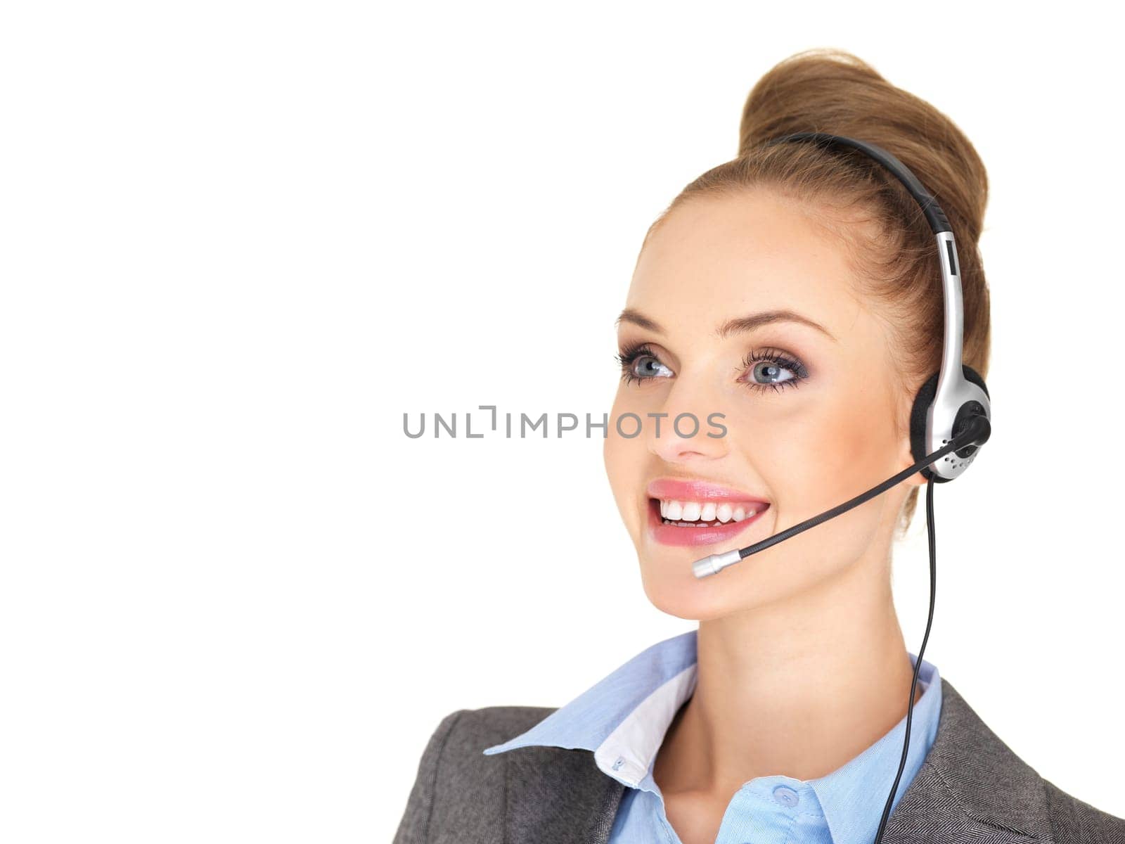 Pretty female businesswoman talking headset
