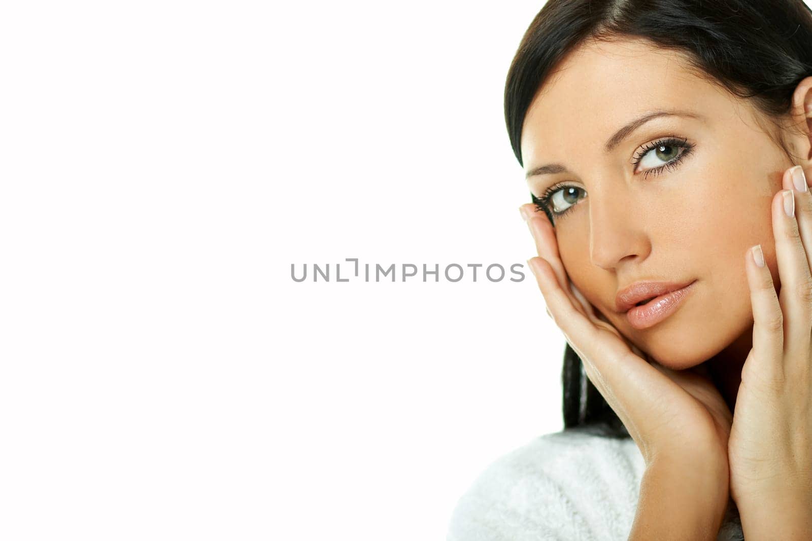 Portrait of Fresh and Beautiful brunette woman on white background wearing white bathrobe