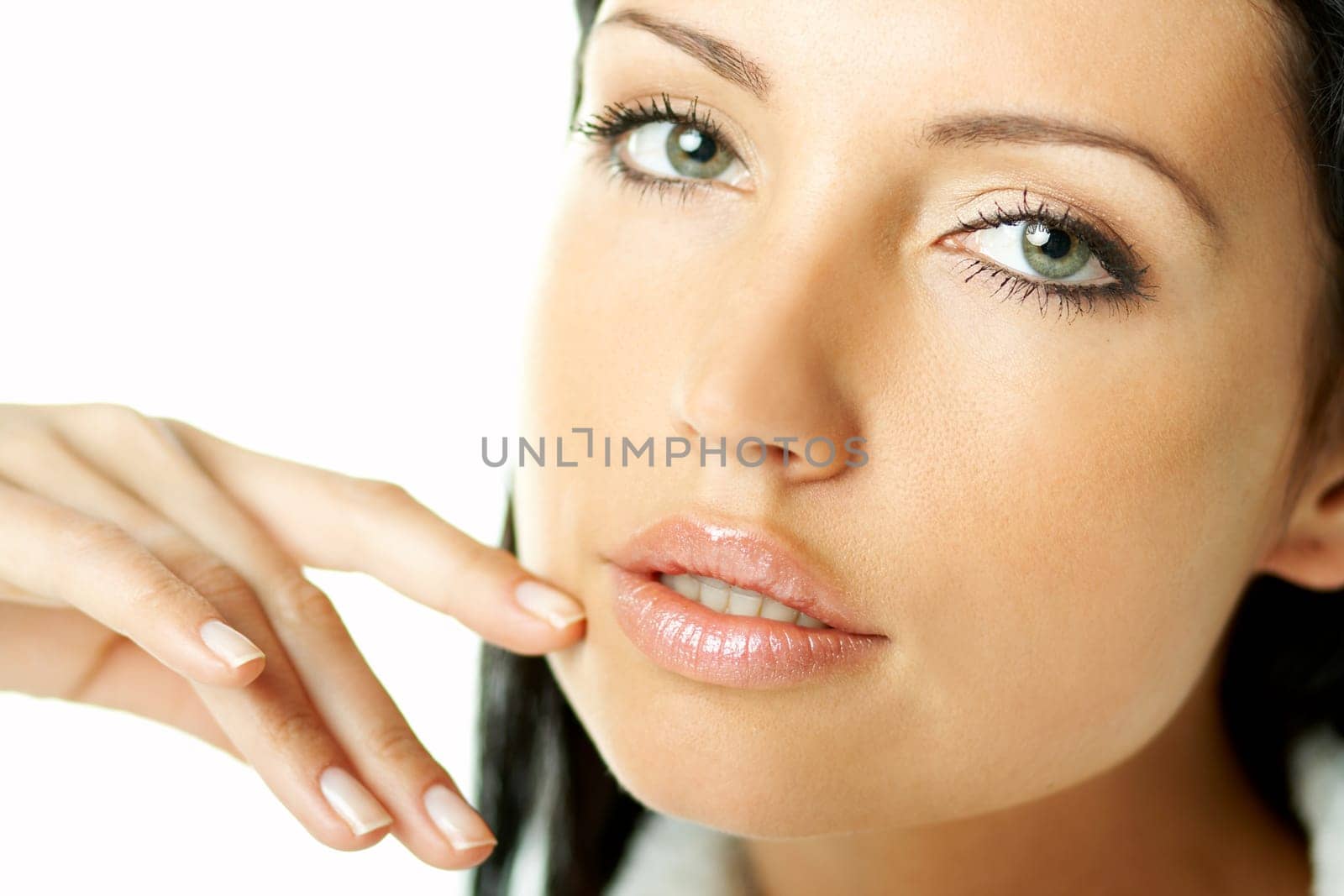 Portrait of Fresh and Beautiful brunette woman on white background wearing white bathrobe