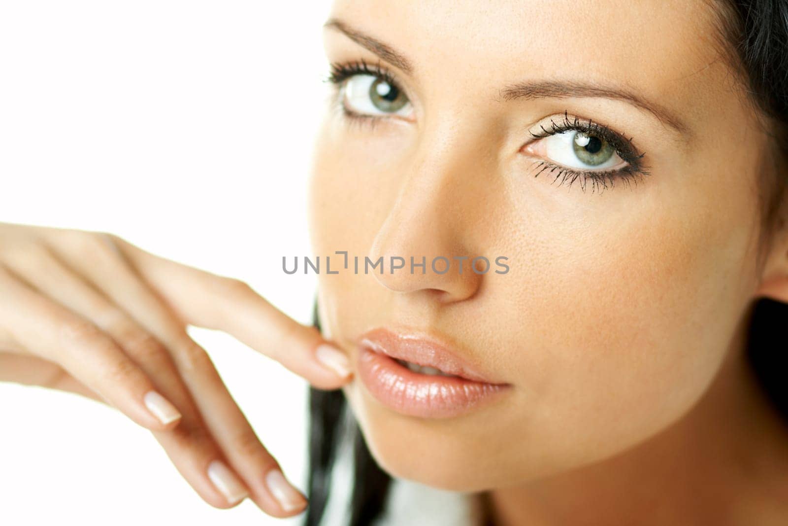 Portrait of Fresh and Beautiful brunette woman on white background wearing white bathrobe