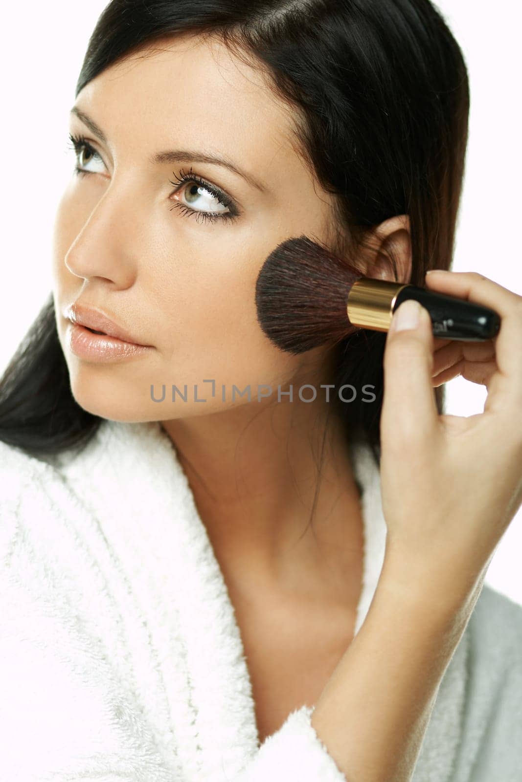 Portrait of Beautiful brunette woman doing daily morning routines (the make up series)