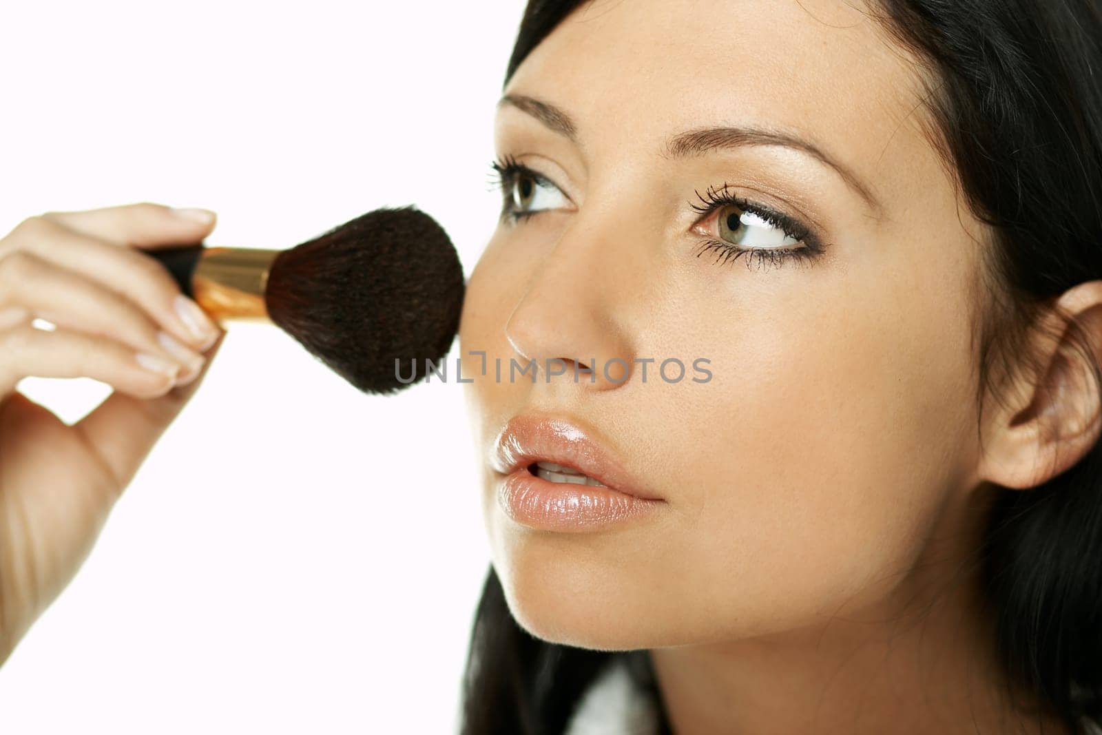 Portrait of Beautiful brunette woman doing daily morning routines (the make up series)