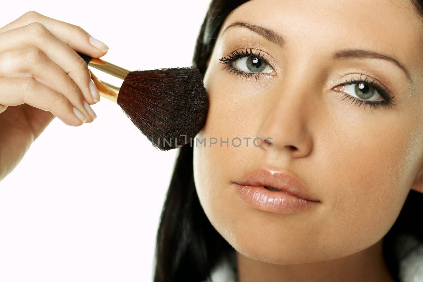 Portrait of Beautiful brunette woman doing daily morning routines (the make up series)