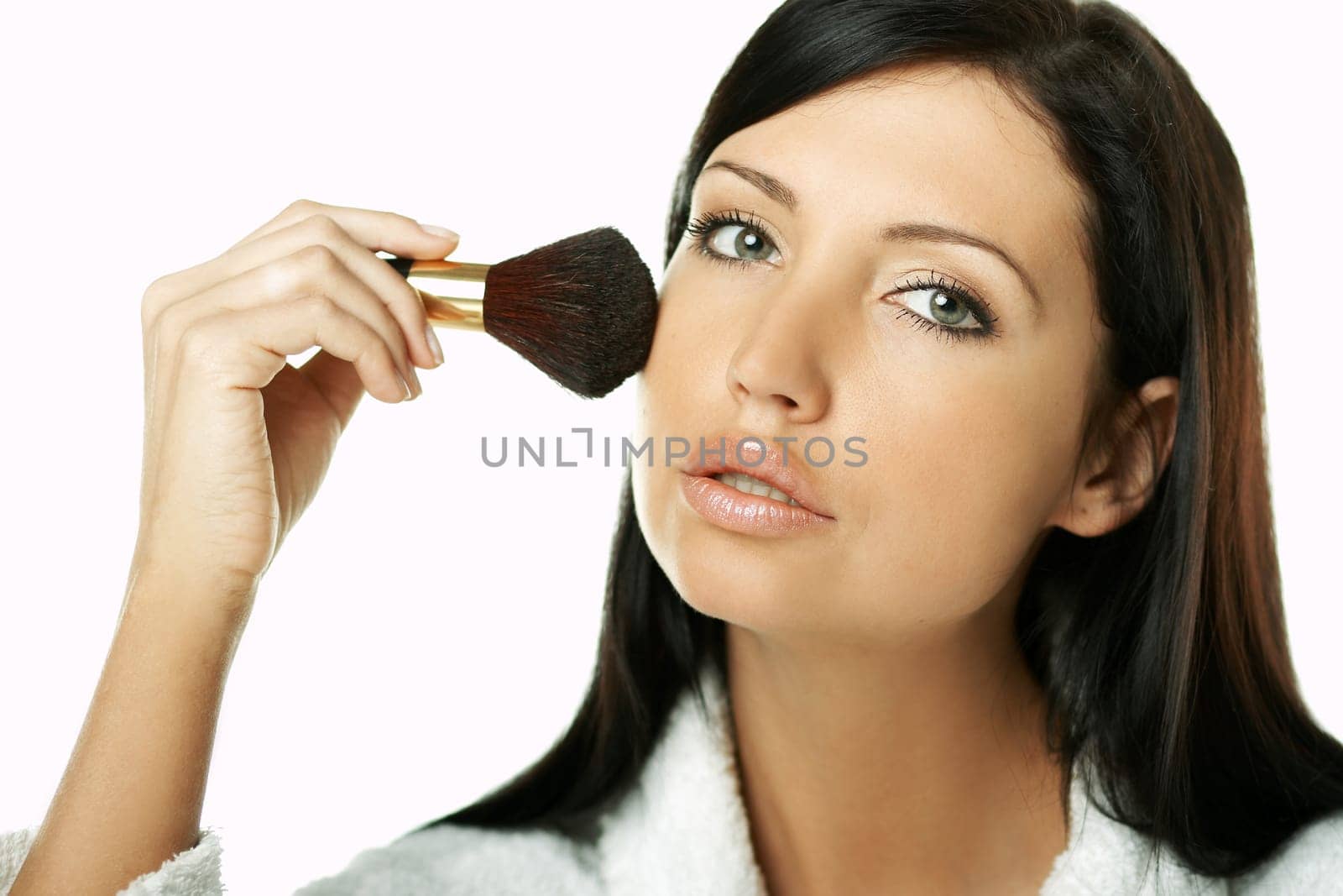 Portrait of Beautiful brunette woman doing daily morning routines (the make up series)