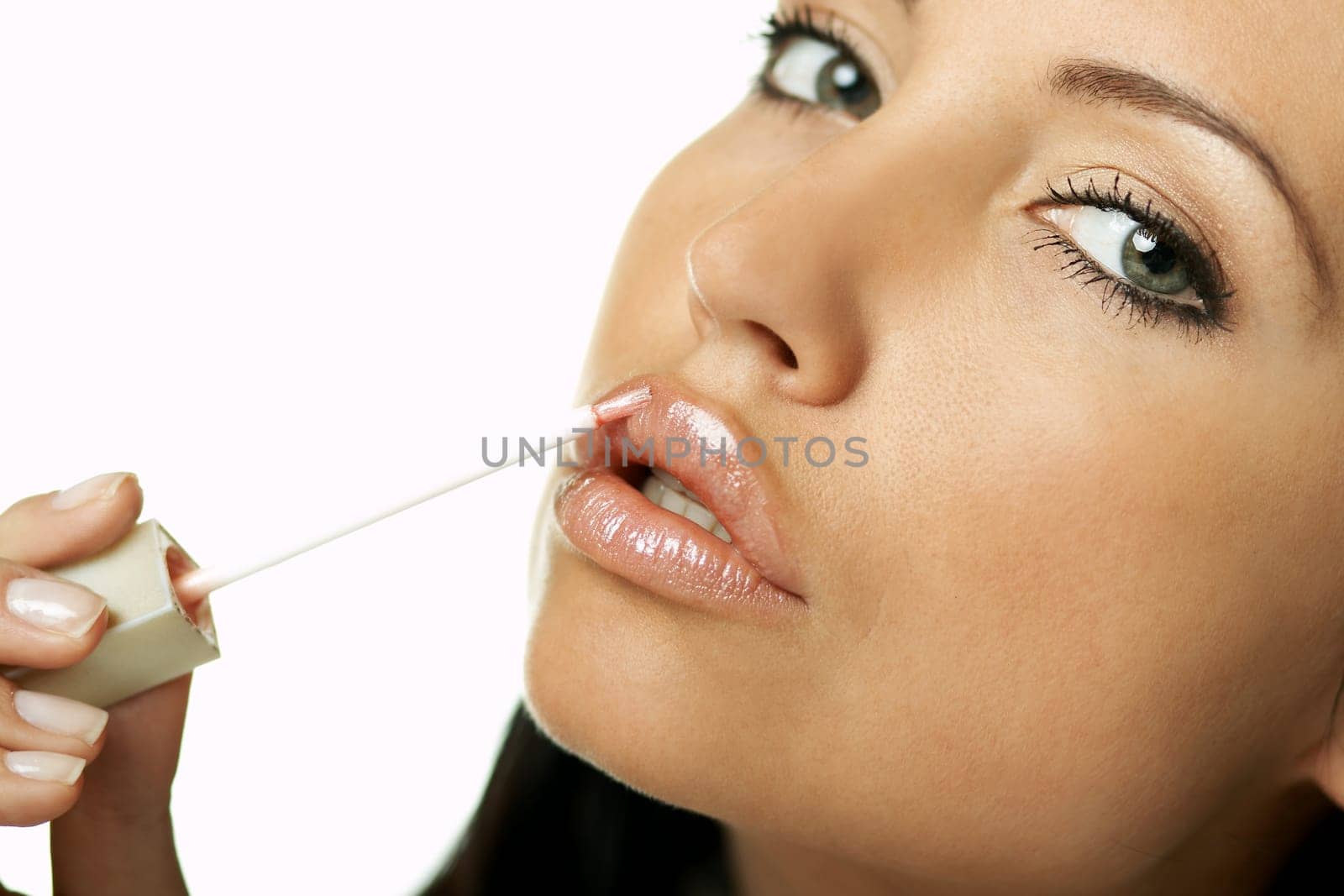 Portrait of Beautiful brunette woman doing daily morning routines (the make up series)