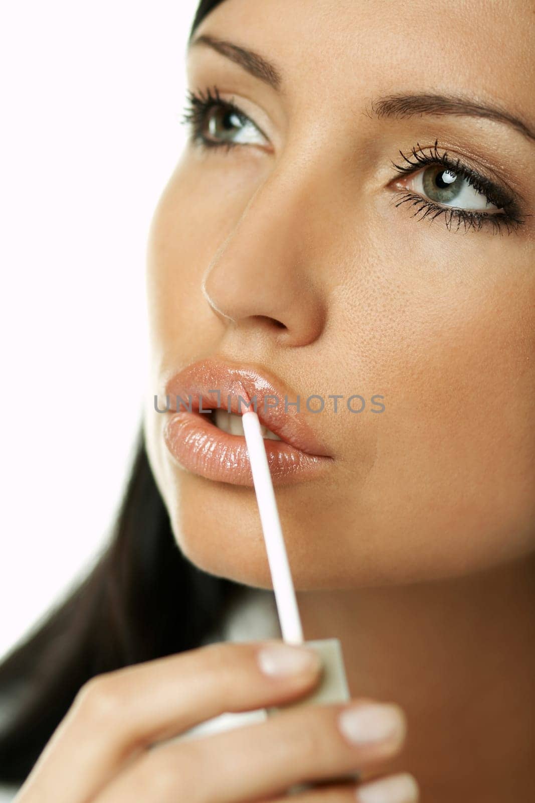Portrait of Beautiful brunette woman doing daily morning routines (the make up series)