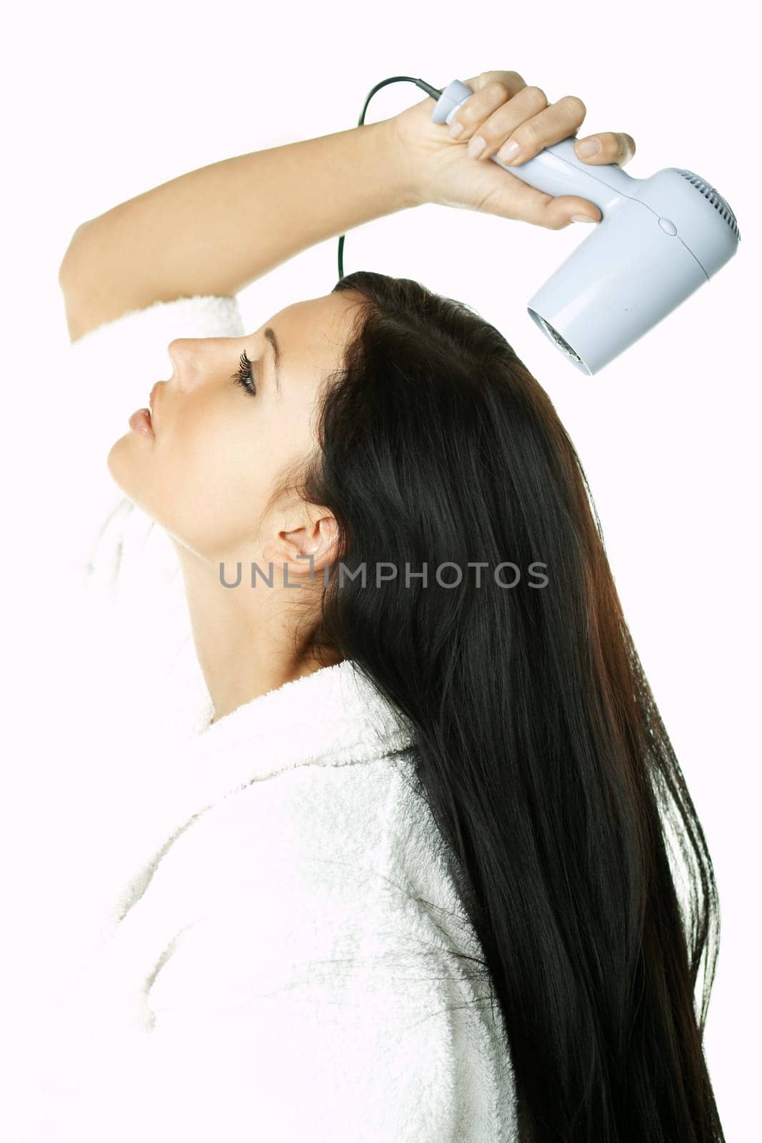 Portrait of Beautiful brunette woman doing daily morning routines (the make up series)