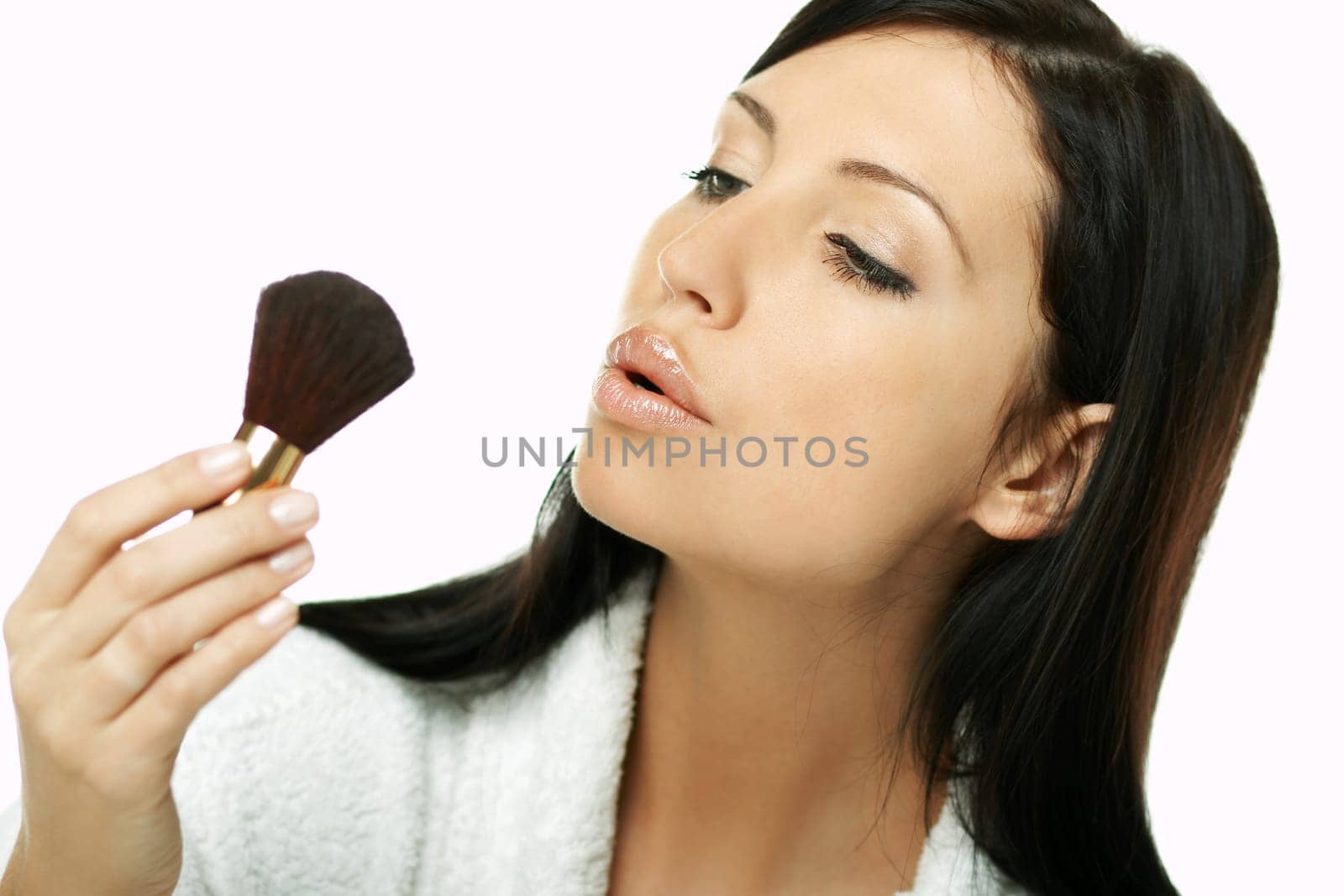 Portrait of Beautiful brunette woman doing daily morning routines (the make up series)