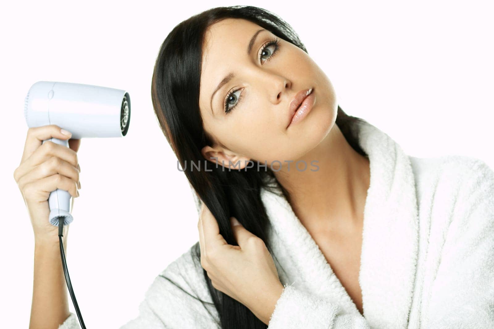 Portrait of Beautiful brunette woman doing daily morning routines (the make up series)