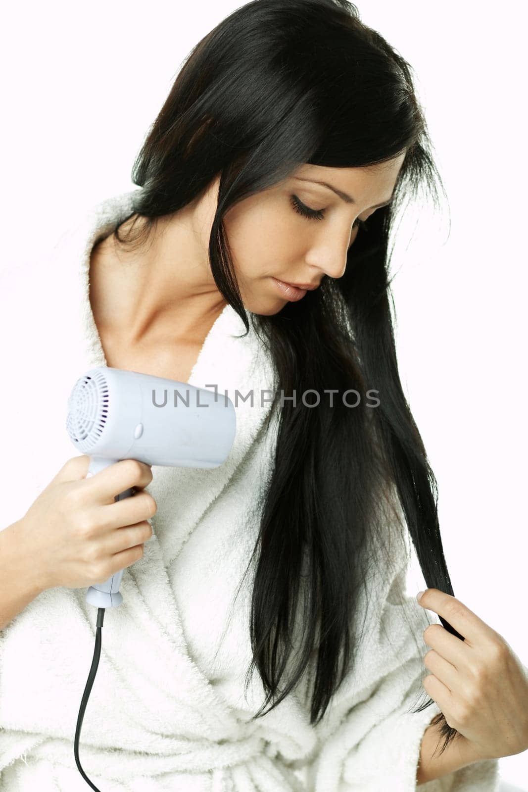 Portrait of Beautiful brunette woman doing daily morning routines (the make up series)