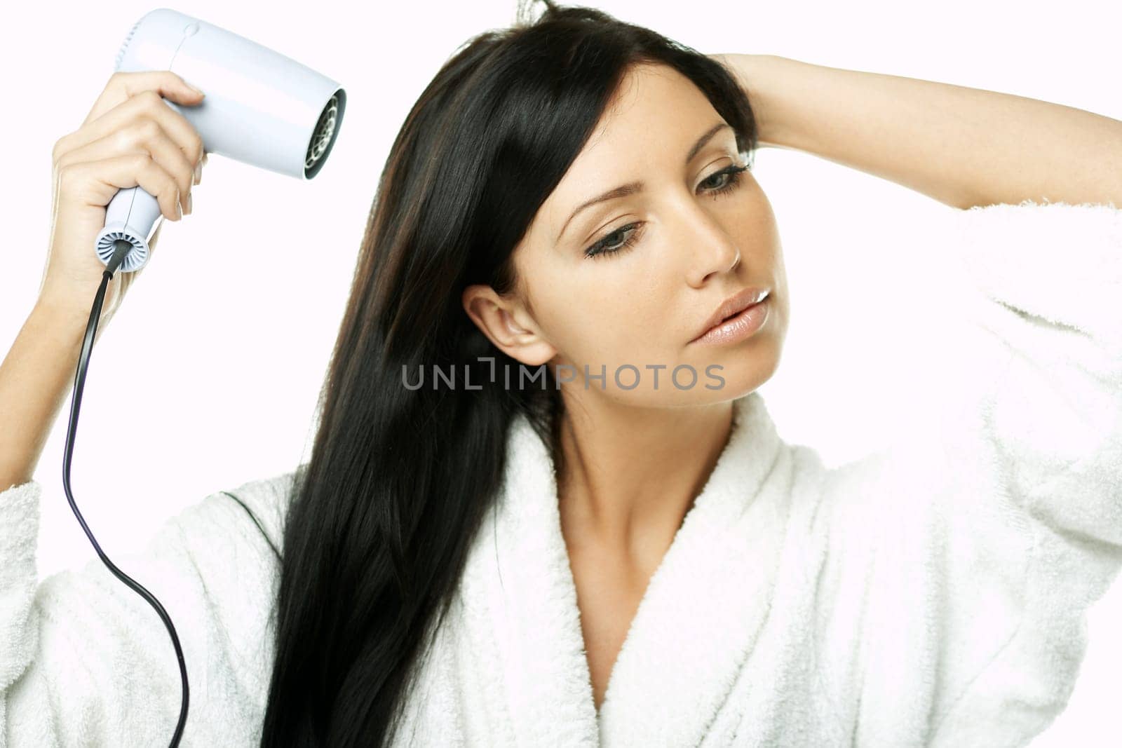 Portrait of Beautiful brunette woman doing daily morning routines (the make up series)