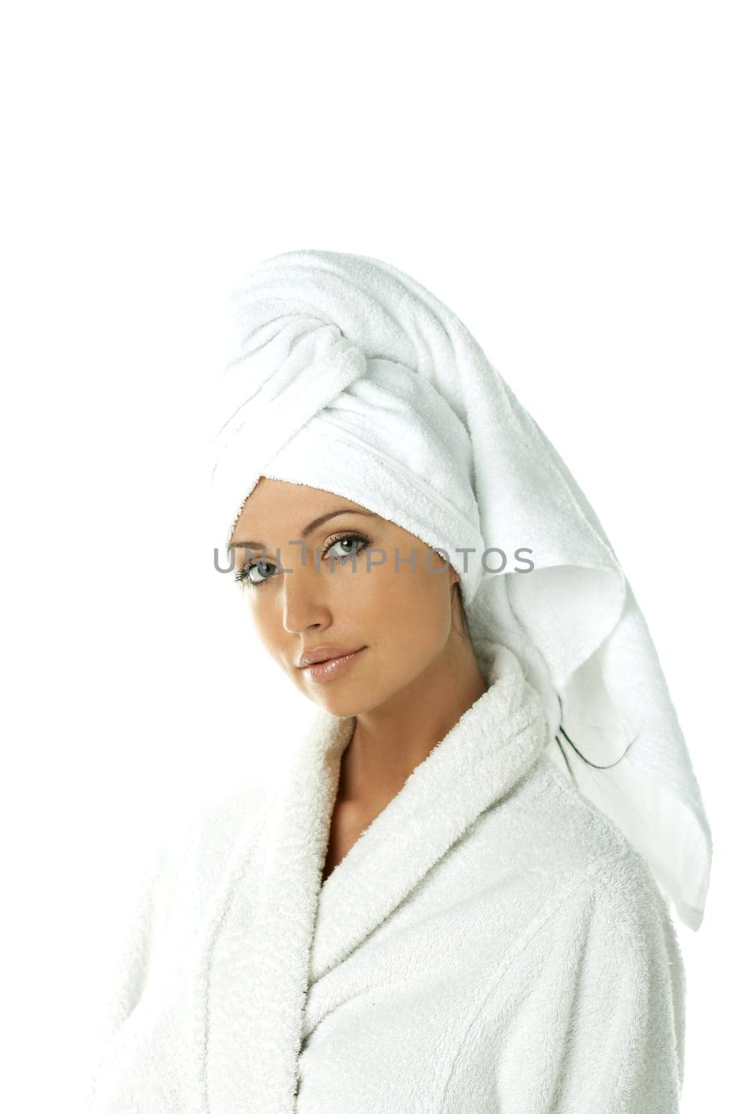 Portrait of Fresh and Beautiful brunette woman wearing white towel on her head