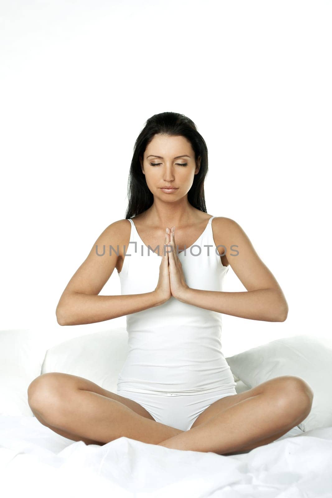 Portrait of Fresh and Beautiful brunette woman on bed