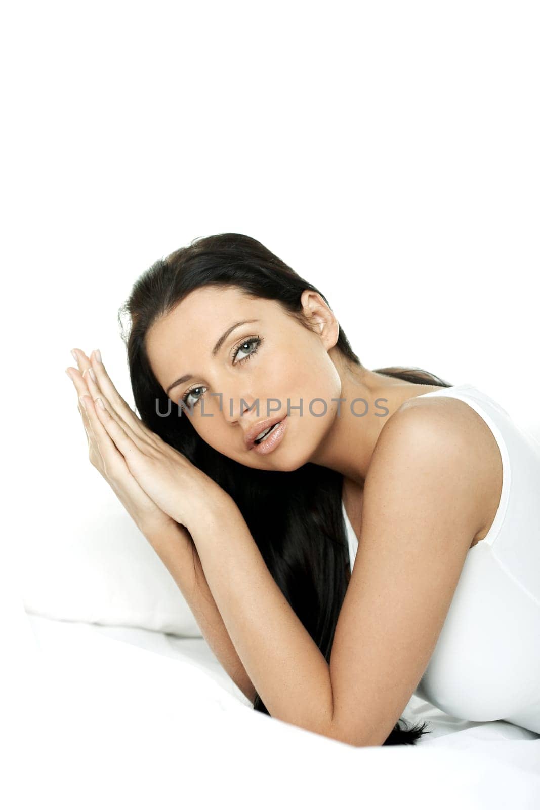 Portrait of Fresh and Beautiful brunette woman on bed