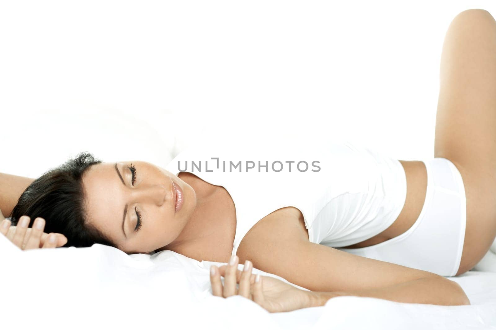 Portrait of Fresh and Beautiful brunette woman on bed