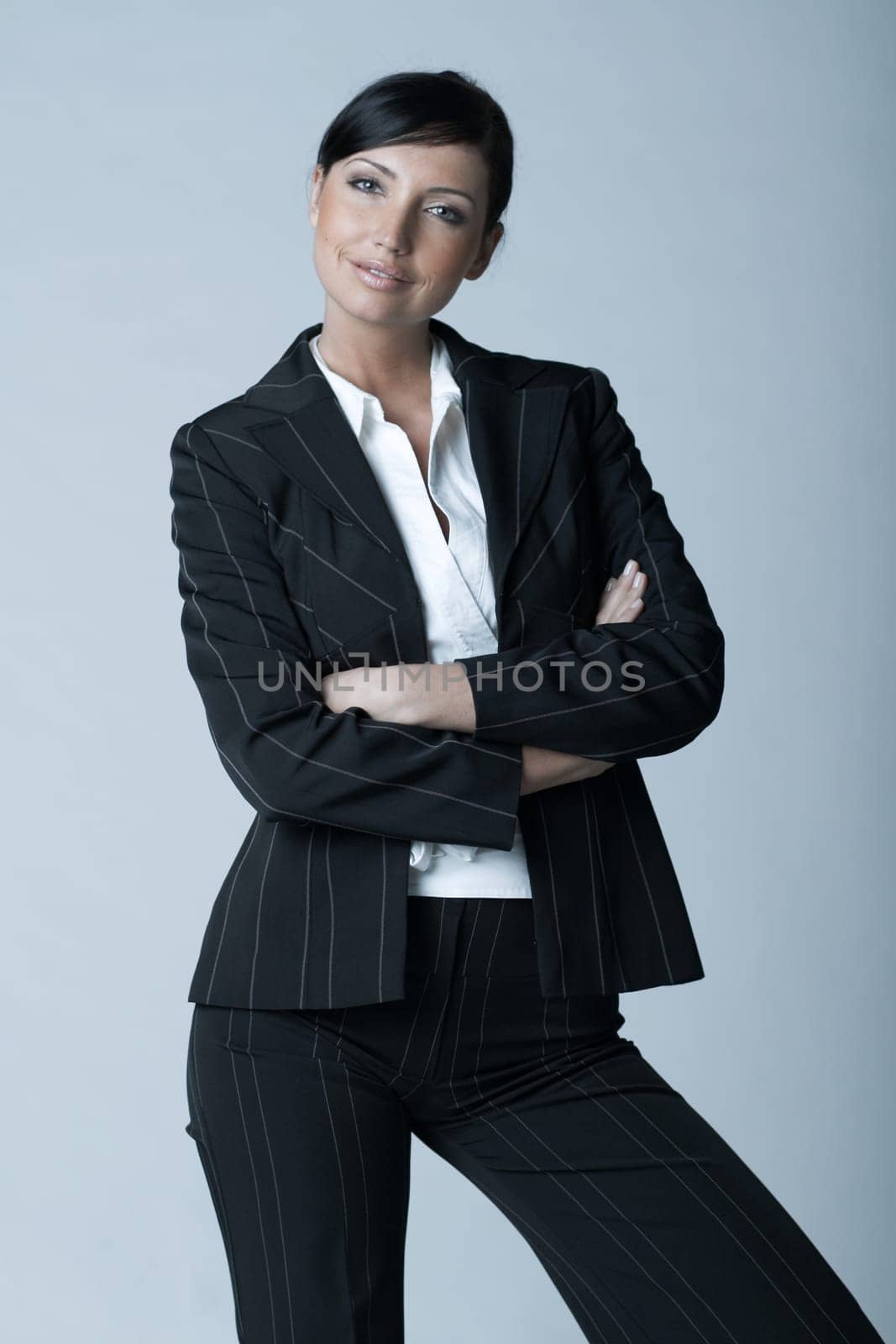 Beautiful and sexy brunette business woman isolated on clear background