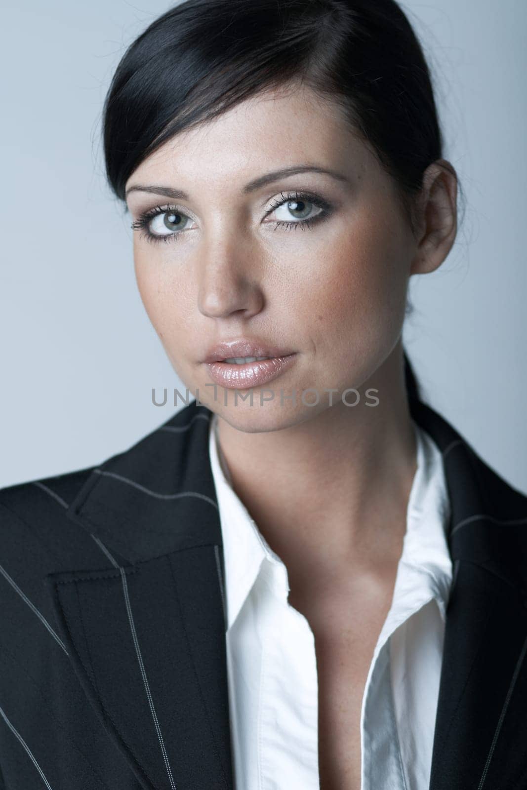 Beautiful and sexy brunette business woman isolated on clear background