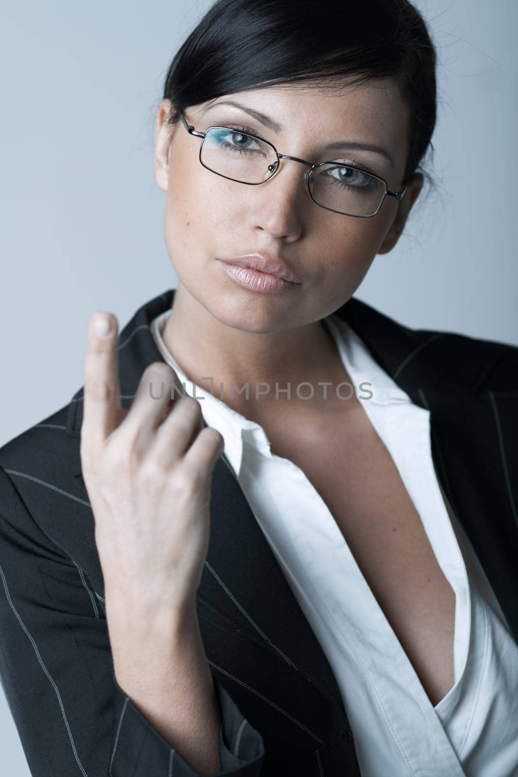 Beautiful and sexy brunette business woman isolated on clear background