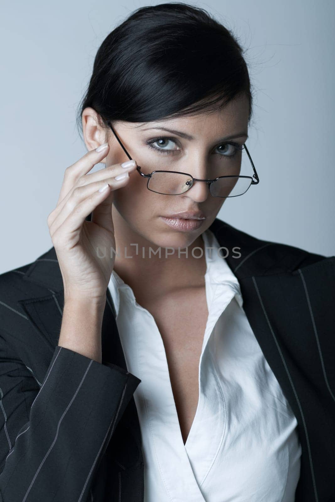 Beautiful brunette business woman with glasses isolated on clear background