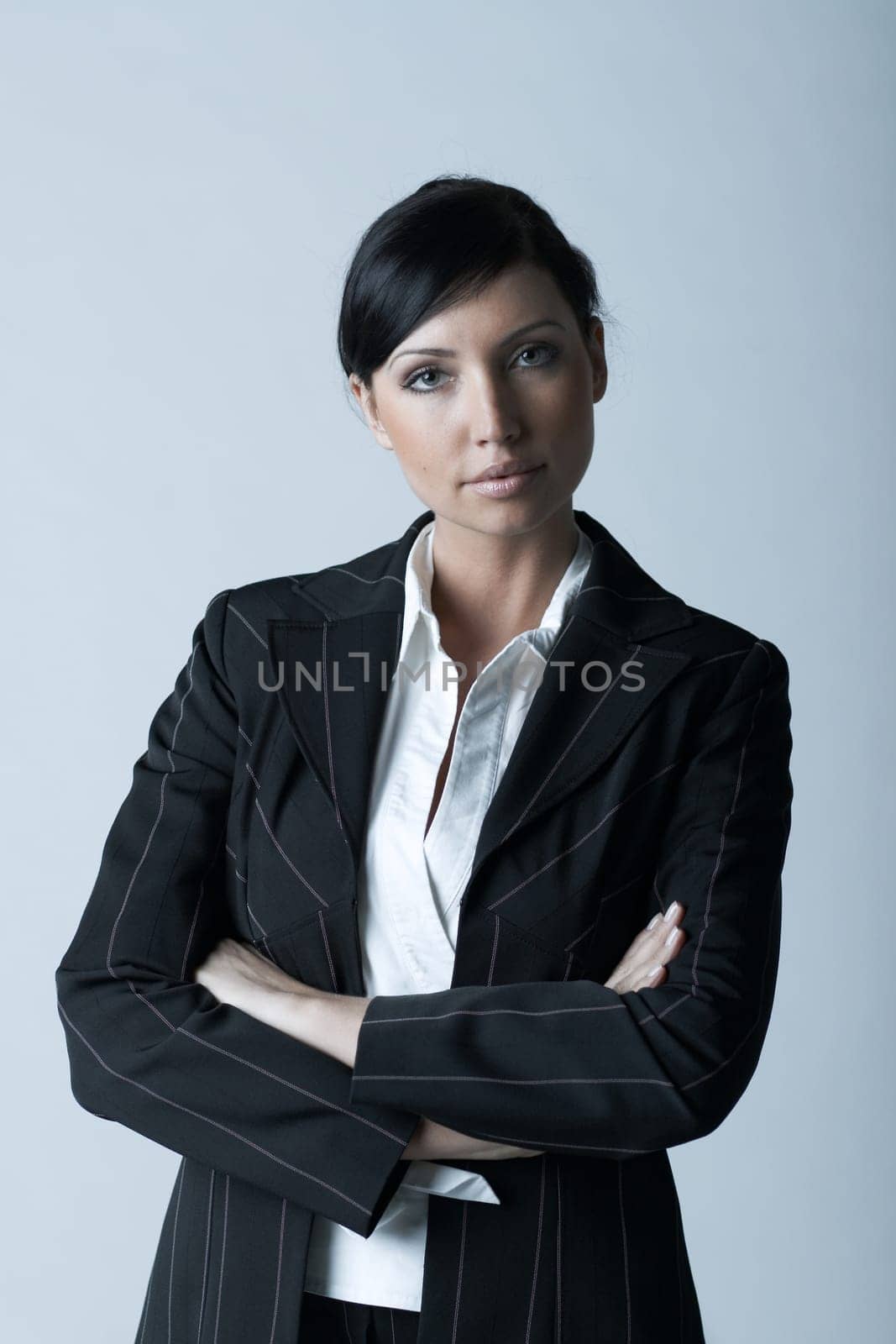 Beautiful and sexy brunette business woman isolated on clear background