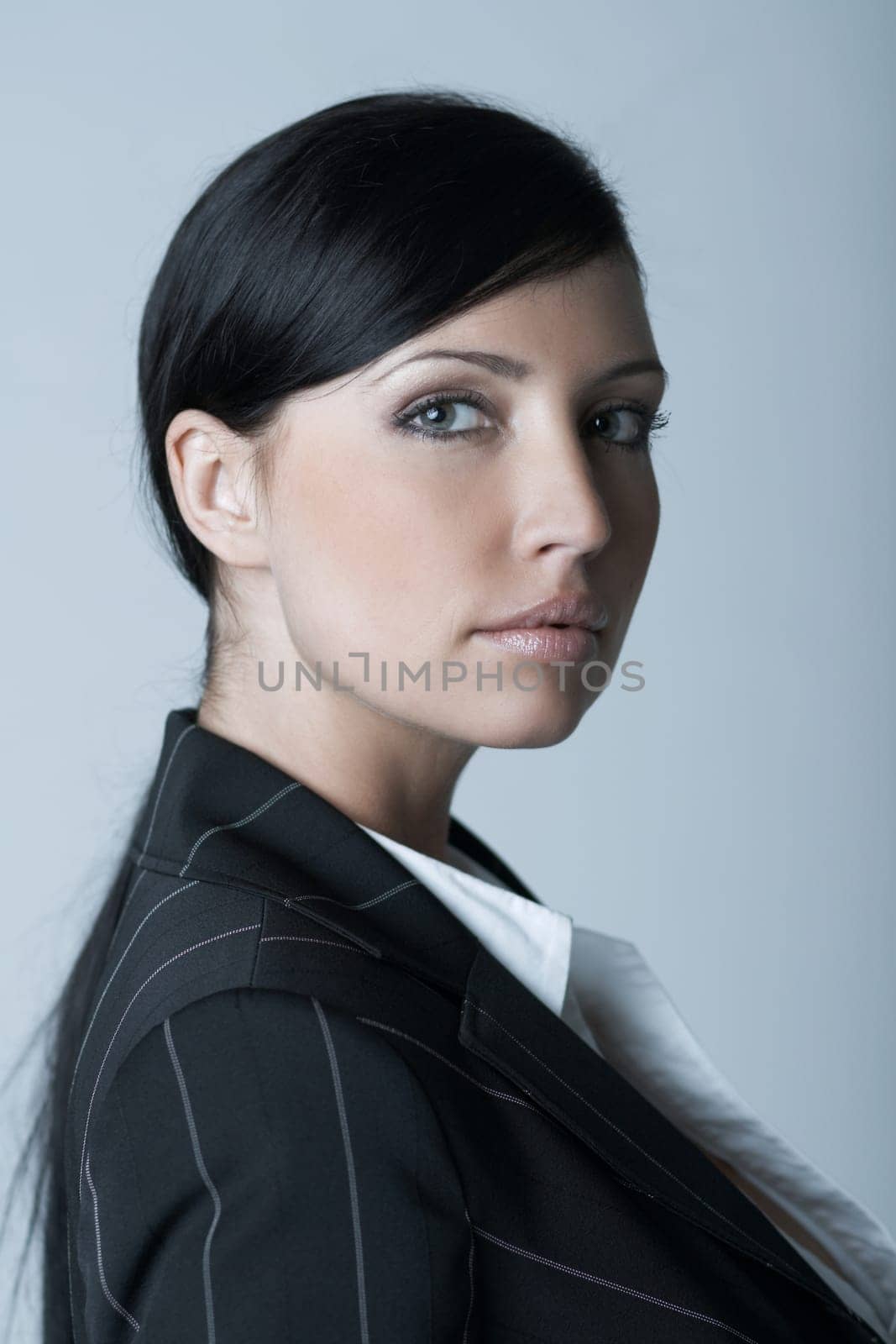 Beautiful brunette business woman isolated on clear background