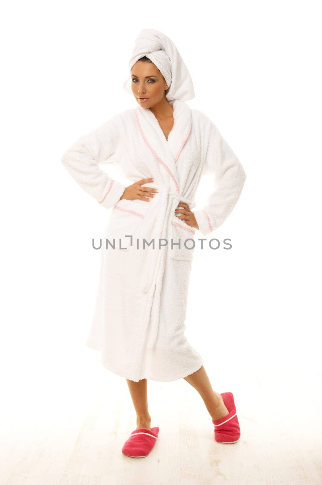 Portrait of 20-25 years old beautiful woman wearing towel on her head