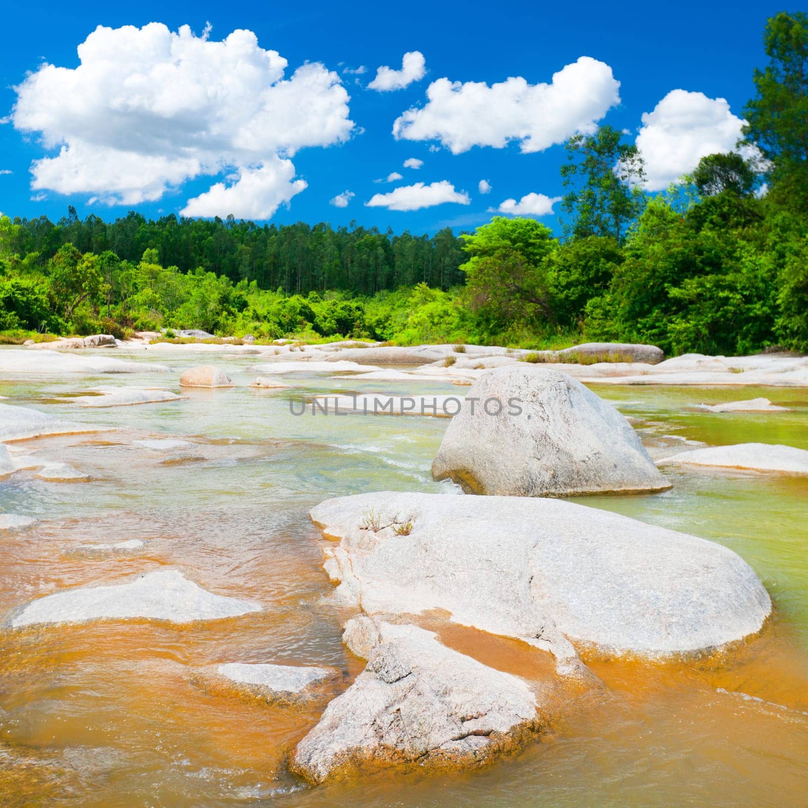 Scenic view of beautiful stream at sunny day