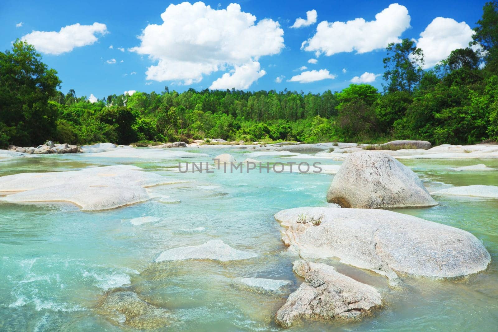 Scenic view of beautiful stream at sunny day
