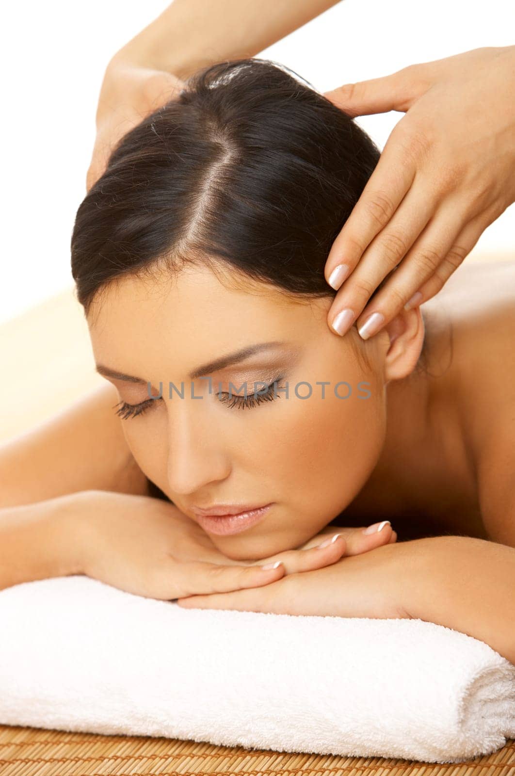 Portrait of Fresh and Beautiful brunette woman taking head massage