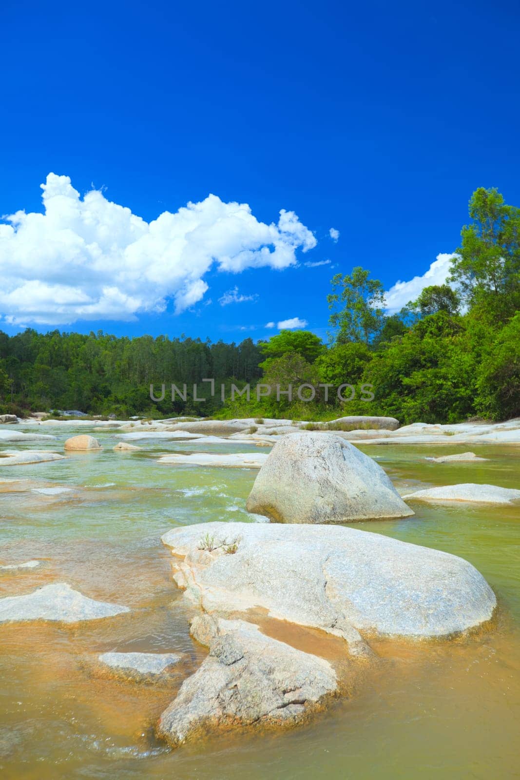 Scenic view of beautiful stream at sunny day