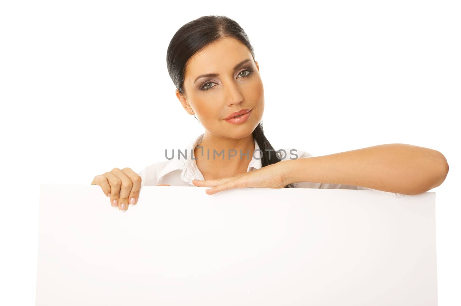 Beautiful business woman holding empty white board
