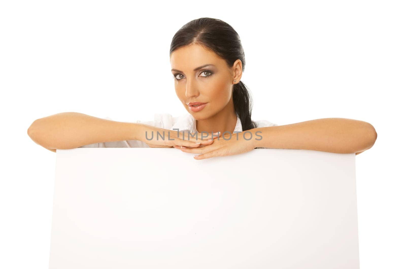 Beautiful business woman holding empty white board