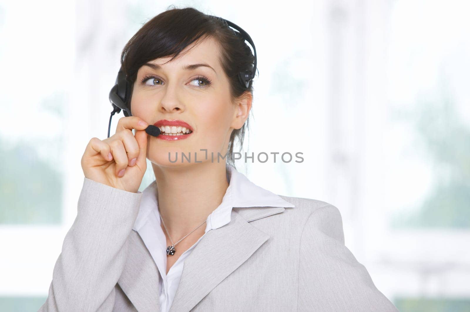 Beautiful business woman is working in her office