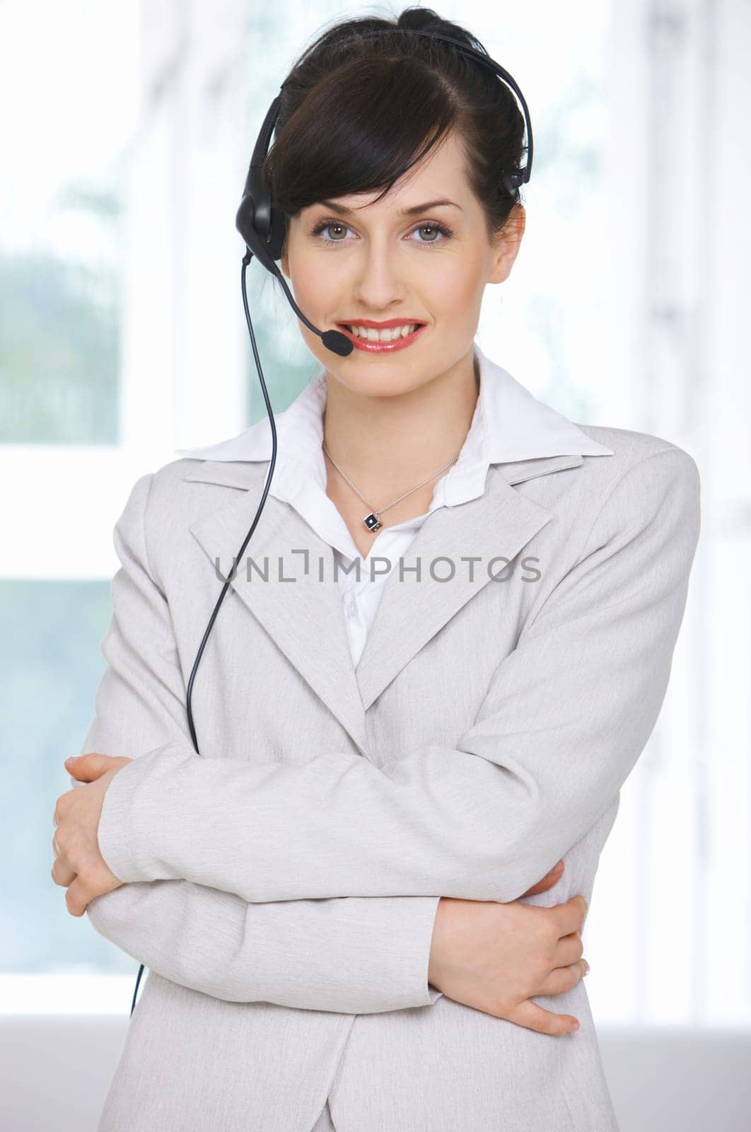 Beautiful business woman is working in her office