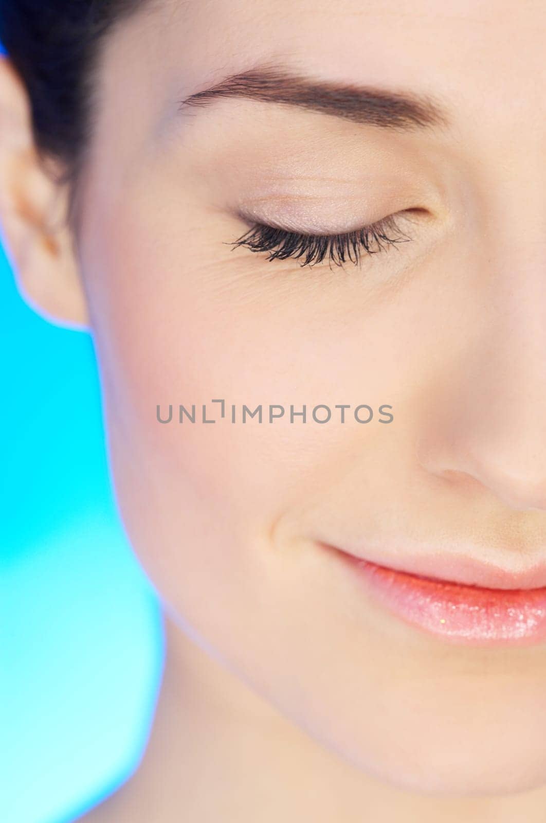 Part of beautiful face of a woman with eye closed