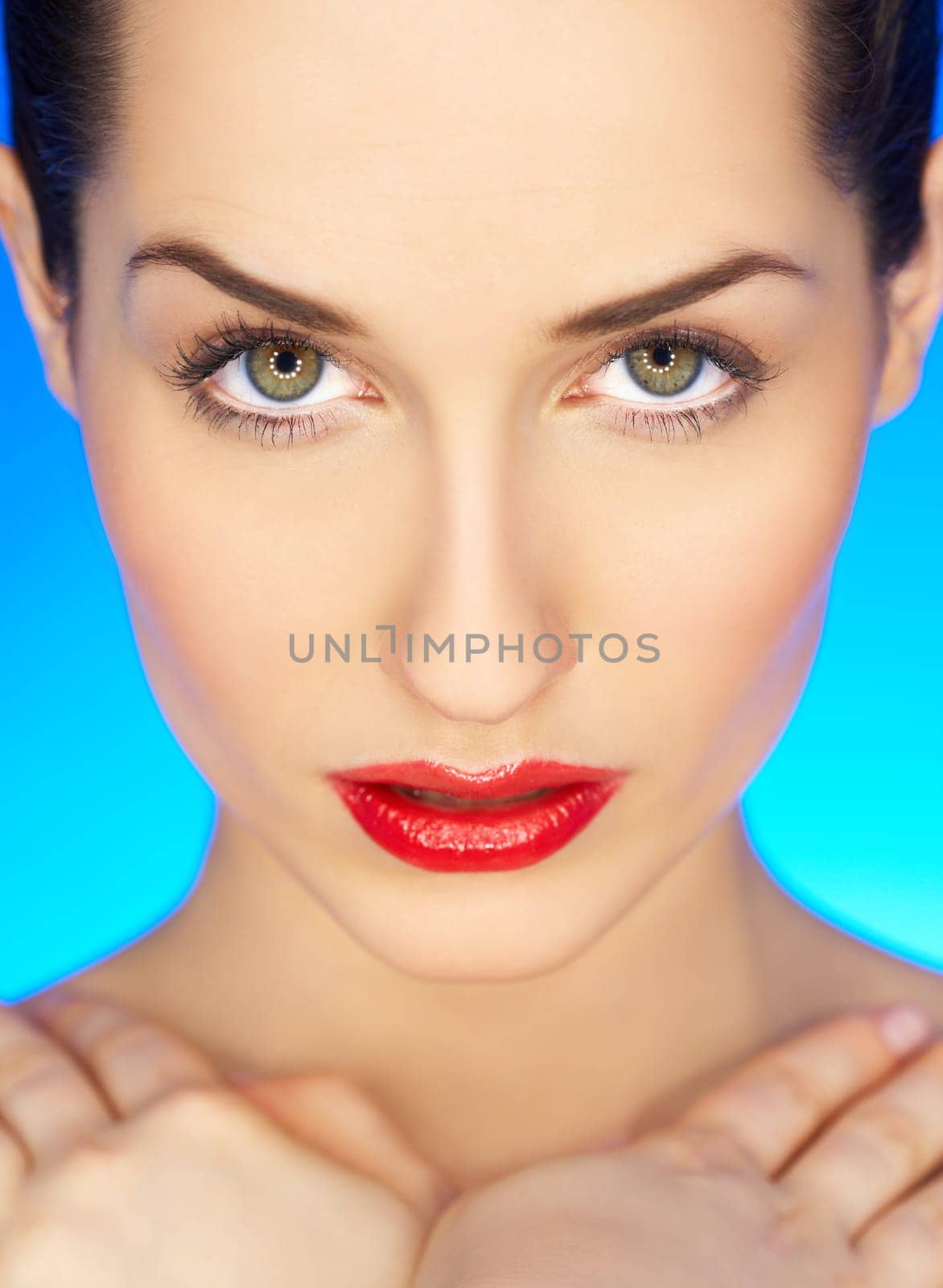 Portrait of beautiful woman with red lipstick