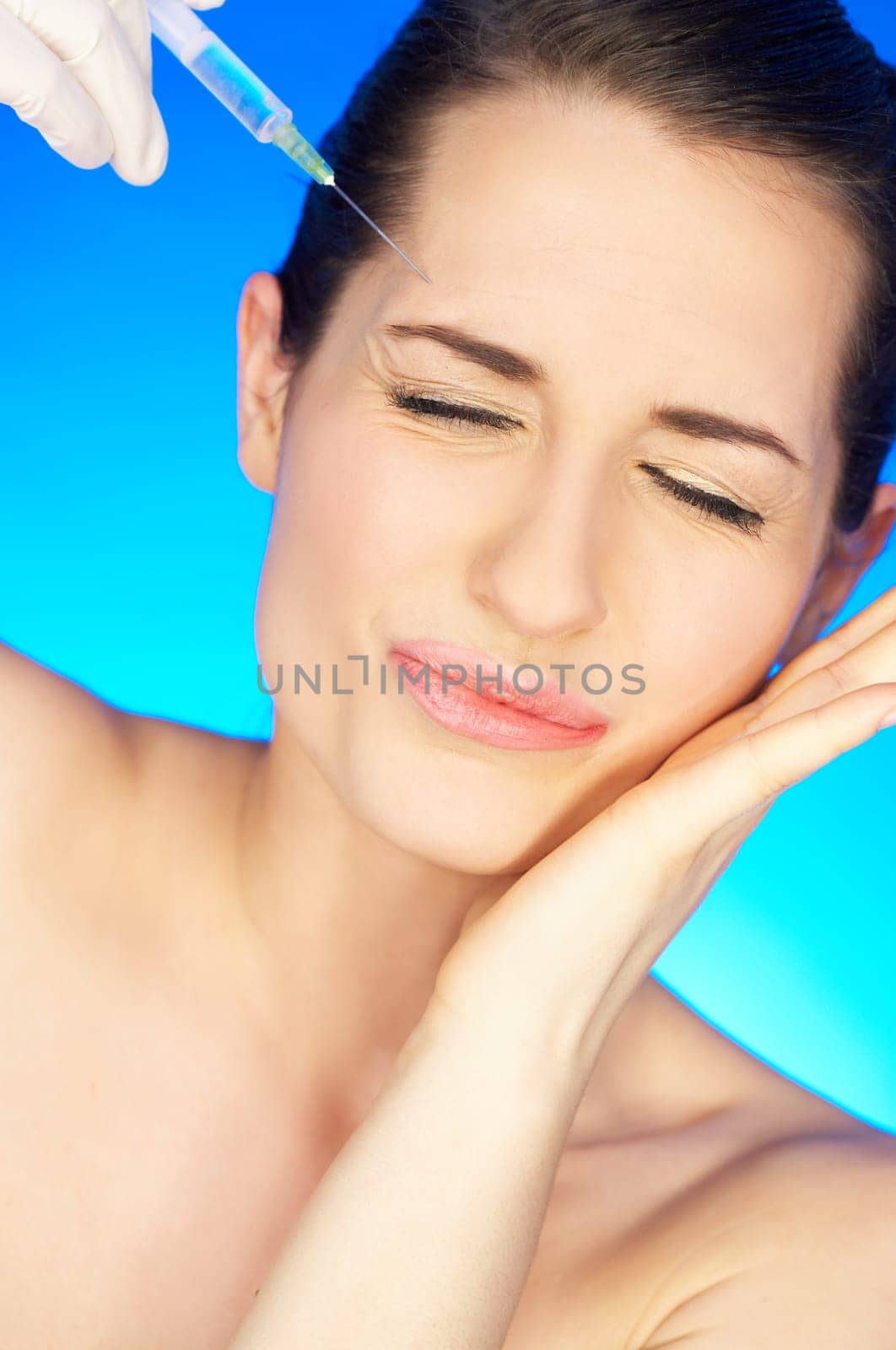 Portrait of Beautiful woman, she recieving a botox injection