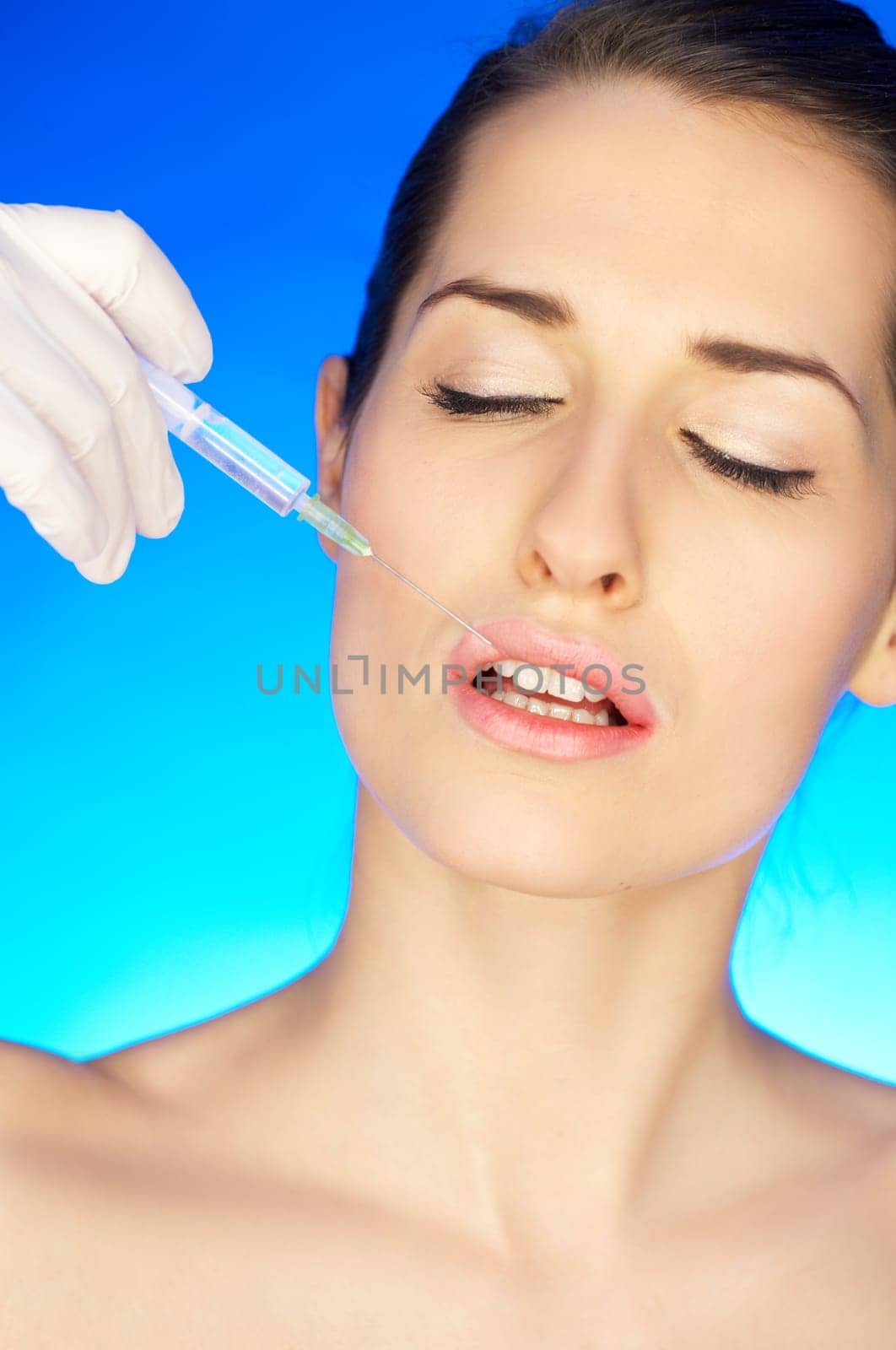 Portrait of Beautiful woman, she recieving a botox injection