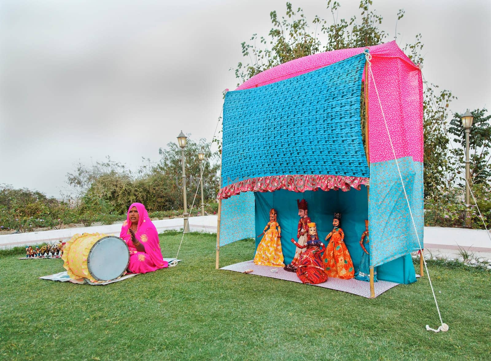 Landscape in a garden of a performance by local puppeteers during and early evening performance, Rajasthan, Indian - March 7, 2012