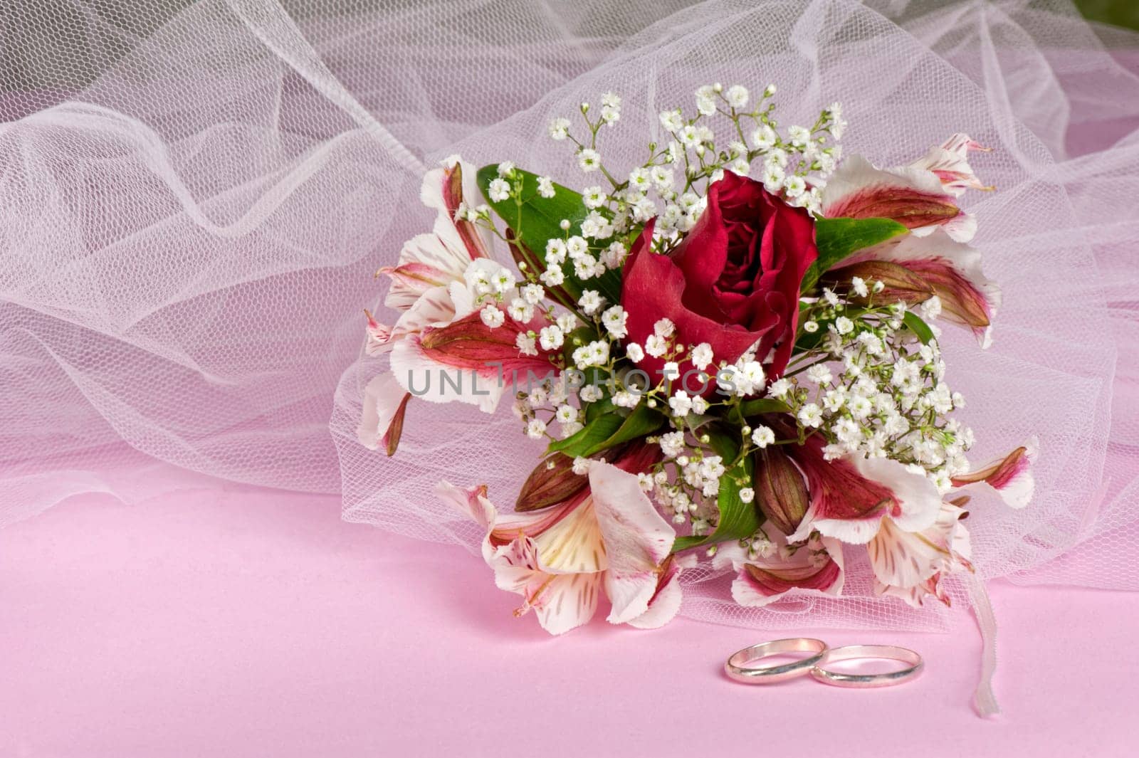 Arrangement with flowers and favors for wedding, baptism and First Communion