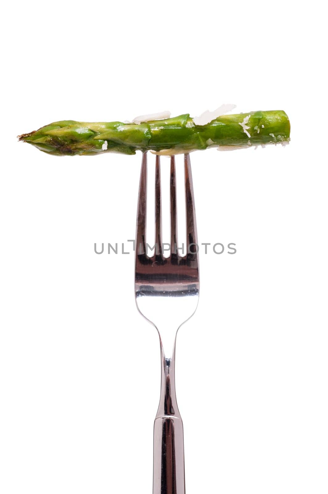 White Isolated Roasted Green Asparagus with Parmesan on a Fork