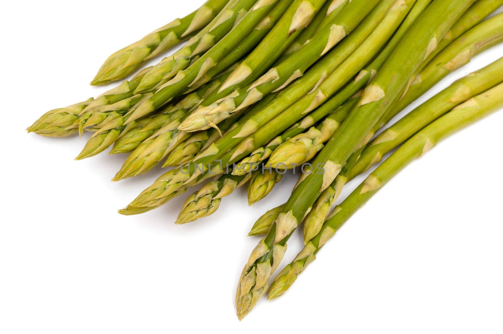 Green asparagus on white background
